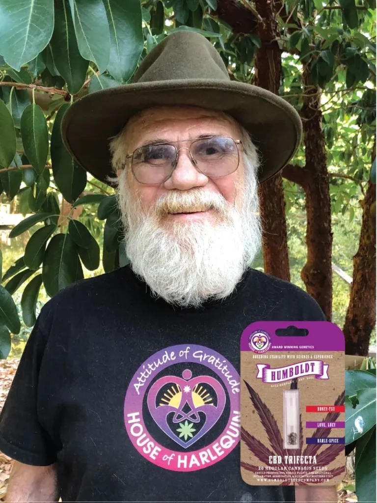 A lush, vibrant CBD cannabis plant full of resinous buds, grown from CBD Trifecta by Humboldt Seed Company, showcasing balanced genetics, high yield, and fragrant herbal sweetness.